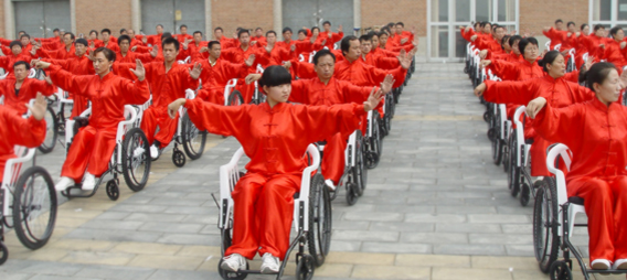 Wheelchair Tai Ji participants prepare for the demonstration at the Opening Ceremony of 2007 Beijing Olympics Cutlrual Festivial (China National Training Center, Beijing 2007)